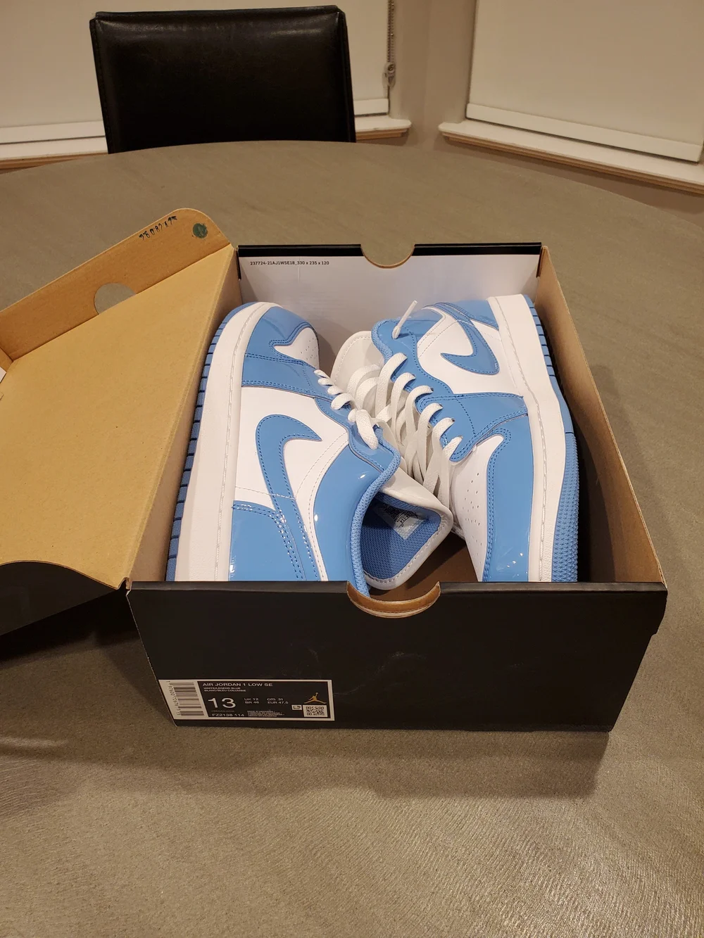Jordan 1 Low Top Sneakers White and University Blue